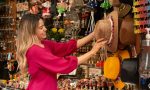 smiley-woman-souvenirs-shop-side-view