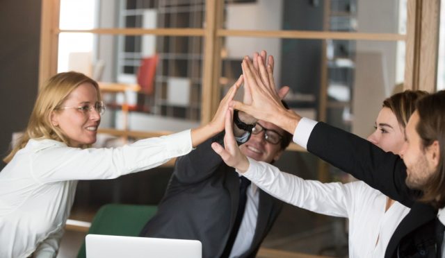 happy-business-team-giving-high-five-together-promising-engagement-loyalty
