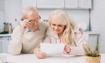 senior-couple-looking-paper